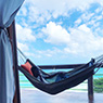 Chris Smith a.k.a. CLS, relaxing in a hammock while on vacation in the Caribbean in an Instagram post